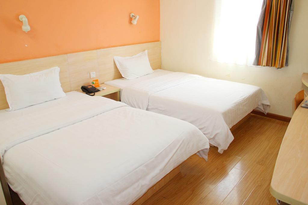 7Days Inn Chengdu Wuda Garden Szoba fotó